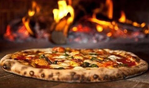 Delicious pizza from the pizzeria "Home pizzeria" in Kiev. Order by promotion