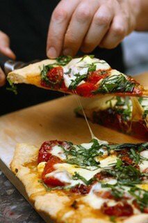Pizza delivery Kiev "Home Pizzeria". Order food at a discount.
