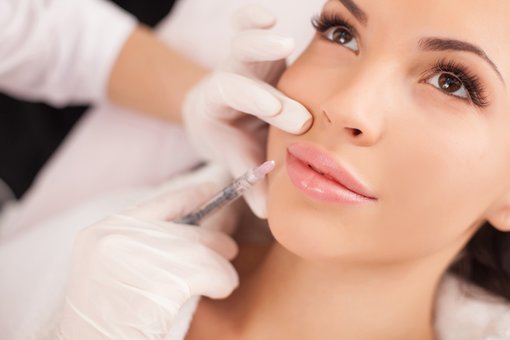 Lip augmentation with hyaluronic acid at Anni Kolesnik Studio in Kharkov. Do according to the action.